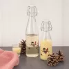 Láhev sklo/kov klip uzávěr SNĚHULÁK 0,52 l